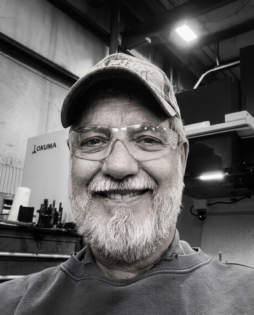 Russell Landes in a machine shop